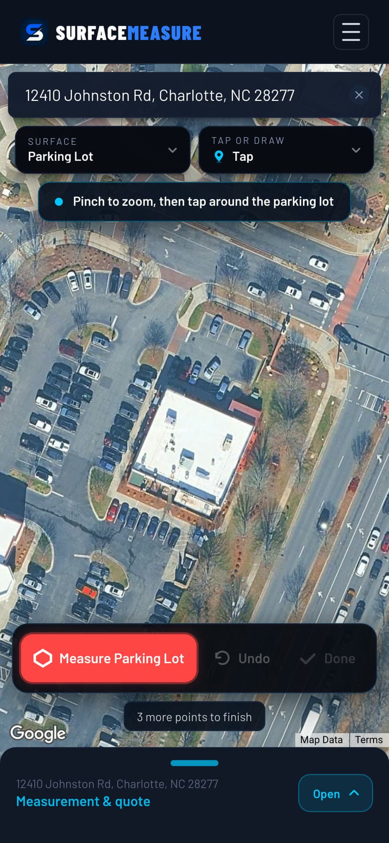 SurfaceMeasure on a phone with 12410 Johnston Rd, Charlotte searched and Parking Lot chosen: the lot is already on screen in satellite imagery, ready to measure