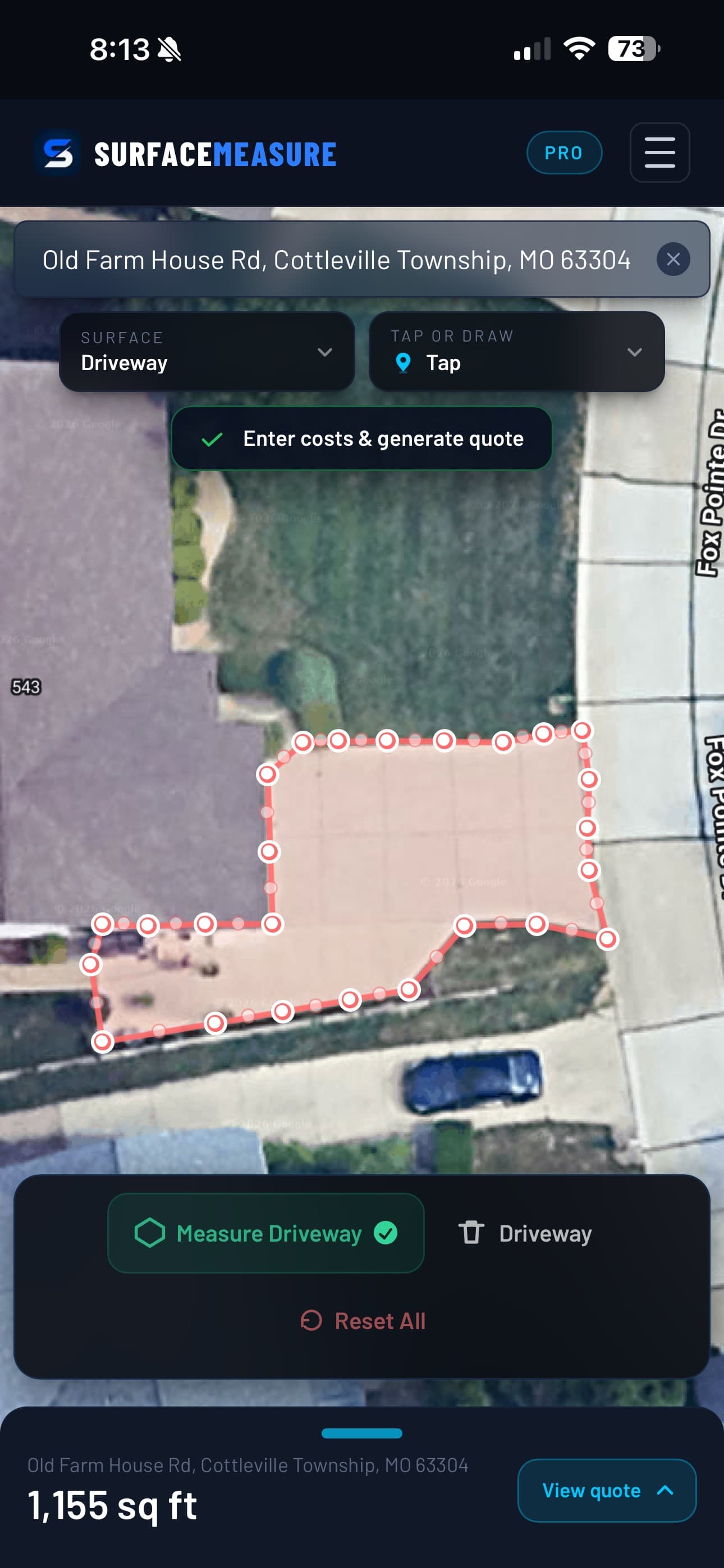 A driveway traced on satellite imagery in SurfaceMeasure, reading 1,155 square feet